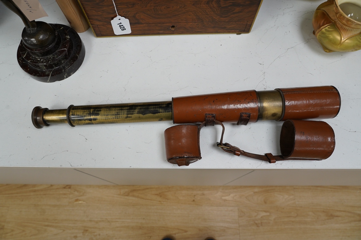 A brass three draw military telescope, marked “ABL 1950 Tel. Sgn. Mk VI. V6-OS 717 GA No 049”. Condition - fair to good, a little worn, good optics